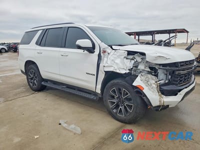 Czwarte zdjęcie samochodu z boku: 2021 CHEVROLET TAHOE VIN:1GNSKPKD9MR128760 - miniatura