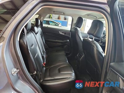Zdjęcie 11 z 13 samochodu: 2022 FORD EDGE TITANIUM VIN:2FMPK4K94NBA63969 - miniatura