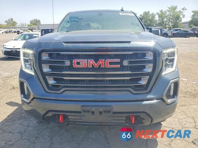 Piąte zdjęcie samochodu w środku: 2021 GMC SIERRA K1500 AT4 VIN:1GTP9EEL2MZ400163 - miniatura