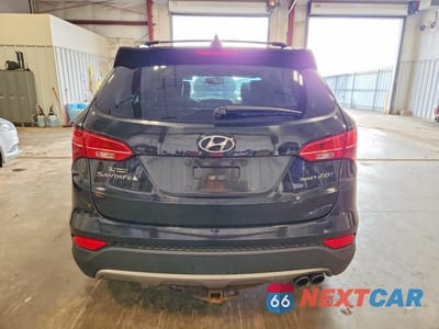 Zdjęcie 6 z 11 samochodu: 2013 HYUNDAI SANTA FE SPORT 2.0T VIN:5XYZU3LA4DG103505 - miniatura