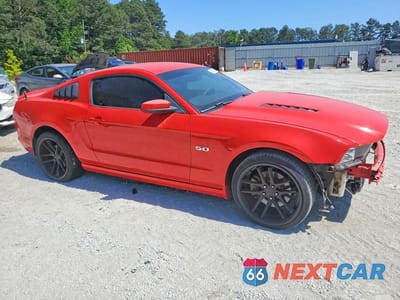 Czwarte zdjęcie samochodu z boku: 2013 FORD MUSTANG GT VIN:1ZVBP8CF4D5270826 - miniatura