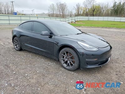 Czwarte zdjęcie samochodu z boku: 2021 TESLA MODEL 3 VIN:5YJ3E1EB1MF064246 - miniatura