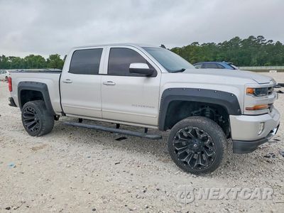 Czwarte zdjęcie samochodu z boku: 2018 CHEVROLET SILVERADO K1500 LT VIN:3GCUKREC0JG495039 - miniatura