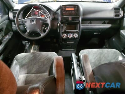 Zdjęcie 8 z 12 samochodu: 2004 HONDA CR-V EX VIN:JHLRD78854C050575 - miniatura
