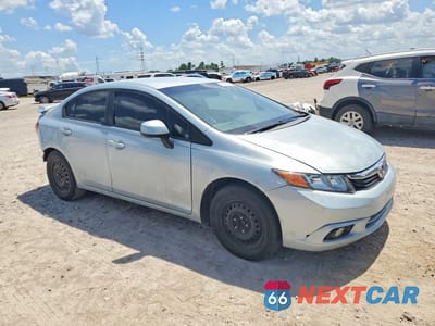 Czwarte zdjęcie samochodu z boku: 2012 HONDA CIVIC LX VIN:2HGFB2F5XCH555848 - miniatura