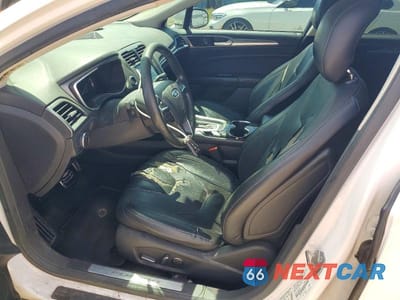 Zdjęcie 7 z 12 samochodu: 2014 FORD FUSION TITANIUM PHEV VIN:3FA6P0SU1ER356802 - miniatura