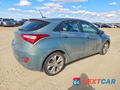 Trzecie zdjęcie samochodu z tyłu: 2013 HYUNDAI ELANTRA GT BASE VIN:KMHD35LE0DU039288 - miniatura
