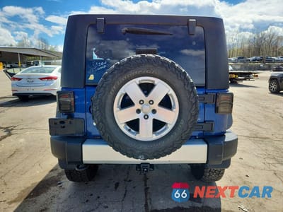 Zdjęcie 6 z 12 samochodu: 2009 JEEP WRANGLER UNLIMITED SAHARA VIN:1J8GA59199L715254 - miniatura