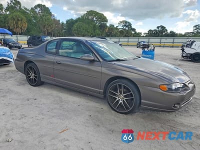 Czwarte zdjęcie samochodu z boku: 2003 CHEVROLET MONTE CARLO SS VIN:2G1WX12K739409450 - miniatura