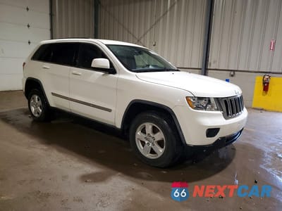 Czwarte zdjęcie samochodu z boku: 2012 JEEP GRAND CHEROKEE LAREDO VIN:1C4RJFAG2CC175291 - miniatura