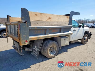 Trzecie zdjęcie samochodu z tyłu: 2012 CHEVROLET SILVERADO DUMP TRUCK VIN:1GB3KZCL2CF118428 - miniatura