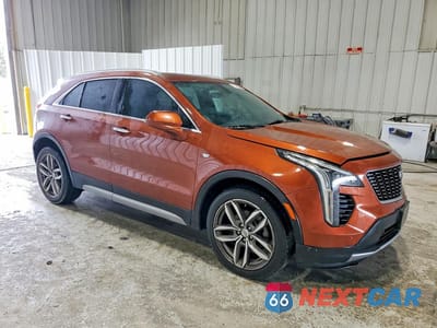 Czwarte zdjęcie samochodu z boku: 2019 CADILLAC XT4 PREMIUM LUXURY VIN:1GYFZCR4XKF228203 - miniatura