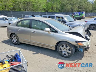 Czwarte zdjęcie samochodu z boku: 2006 HONDA CIVIC LX VIN:2HGFA16556H514559 - miniatura