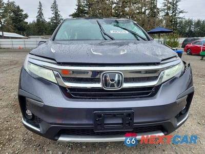 Piąte zdjęcie samochodu w środku: 2022 HONDA PILOT TOURING VIN:5FNYF5H67NB029186 - miniatura