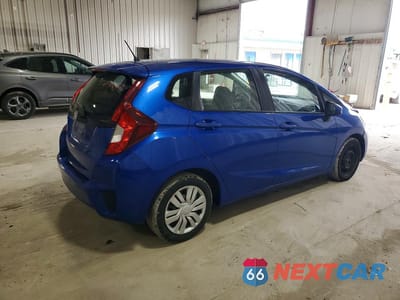 Trzecie zdjęcie samochodu z tyłu: 2016 HONDA FIT LX VIN:JHMGK5H5XGX032640 - miniatura