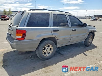 Trzecie zdjęcie samochodu z tyłu: 1999 JEEP GRAND CHEROKEE LAREDO VIN:1J4GW58S1XC564663 - miniatura