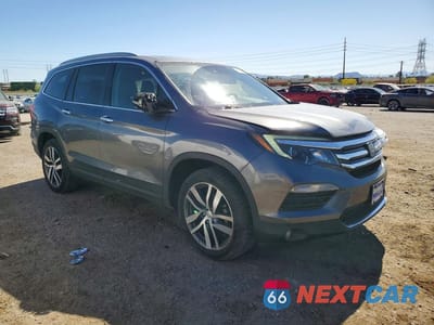 Czwarte zdjęcie samochodu z boku: 2016 HONDA PILOT ELITE VIN:5FNYF6H02GB117812 - miniatura
