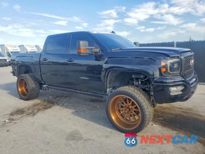 Czwarte zdjęcie samochodu z boku: 2018 GMC SIERRA K1500 DENALI VIN:3GTU2PEJ3JG222664 - miniatura