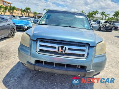 Piąte zdjęcie samochodu w środku: 2007 HONDA PILOT EXL VIN:5FNYF287X7B009606 - miniatura