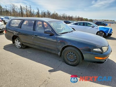 Czwarte zdjęcie samochodu z boku: 1994 TOYOTA CAMRY LE VIN:4T1GK12W7RU057149 - miniatura