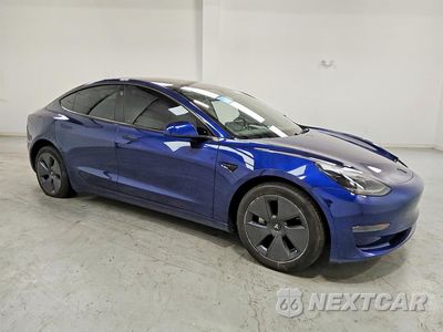 Czwarte zdjęcie samochodu z boku: 2023 TESLA MODEL 3 VIN:5YJ3E1EA9PF665190 - miniatura