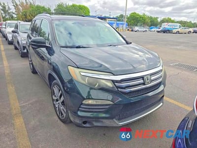 2016 HONDA PILOT TOURING 5FNYF5H96GB009783 - główne zdjęcie licytacji z USA - miniatura