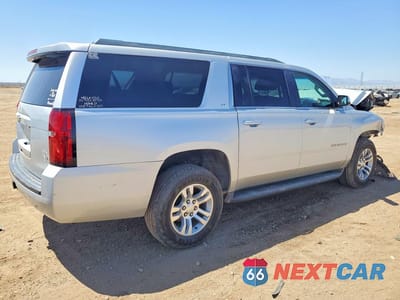 Trzecie zdjęcie samochodu z tyłu: 2016 CHEVROLET SUBURBAN K1500 LT VIN:1GNSKHKC6GR450256 - miniatura