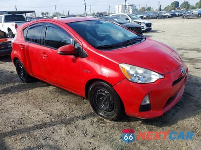 Czwarte zdjęcie samochodu z boku: 2014 TOYOTA PRIUS C TWO VIN:JTDKDTB3XE1559353 - miniatura