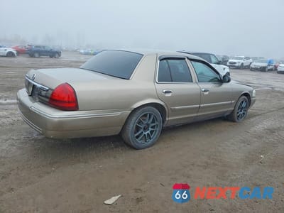 Trzecie zdjęcie samochodu z tyłu: 2006 MERCURY GRAND MARQUIS LS VIN:2MEFM75V56X650625 - miniatura