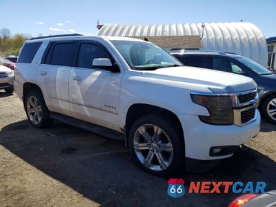 Czwarte zdjęcie samochodu z boku: 2015 CHEVROLET TAHOE K1500 LT VIN:1GNSKBKC7FR105975 - miniatura