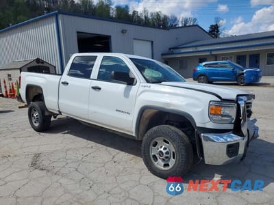 Czwarte zdjęcie samochodu z boku: 2018 GMC SIERRA K2500 HEAVY DUTY VIN:1GT12REG2JF156094 - miniatura