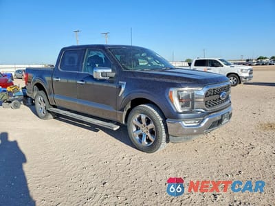 Czwarte zdjęcie samochodu z boku: 2022 FORD F150 SUPERCREW VIN:1FTFW1E80NFA79638 - miniatura