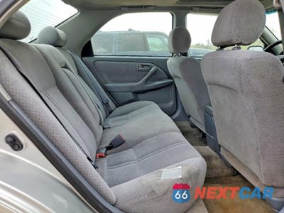 Zdjęcie 10 z 11 samochodu: 2001 TOYOTA CAMRY LE VIN:4T1BG22KX1U864980 - miniatura