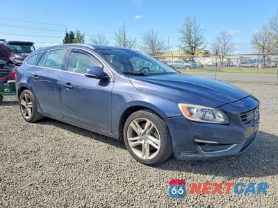 Czwarte zdjęcie samochodu z boku: 2015 VOLVO V60 PREMIER VIN:YV140MEK5F1221979 - miniatura