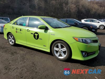 Czwarte zdjęcie samochodu z boku: 2014 TOYOTA CAMRY HYBRID SE VIN:4T1BD1FK5EU127964 - miniatura