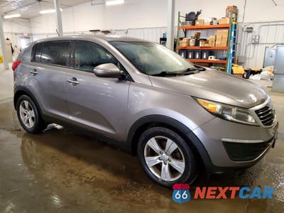 Czwarte zdjęcie samochodu z boku: 2013 KIA SPORTAGE LX VIN:KNDPBCA26D7453921 - miniatura