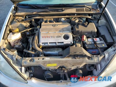 Zdjęcie 11 z 11 samochodu: 2004 TOYOTA CAMRY LE V6 VIN:4T1BF32K54U079683 - miniatura