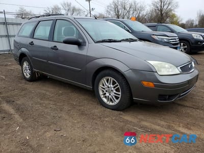 Czwarte zdjęcie samochodu z boku: 2005 FORD FOCUS ZXW VIN:1FAFP36N35W178702 - miniatura