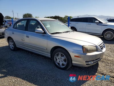 Czwarte zdjęcie samochodu z boku: 2004 HYUNDAI ELANTRA GLS VIN:KMHDN46D64U819609 - miniatura