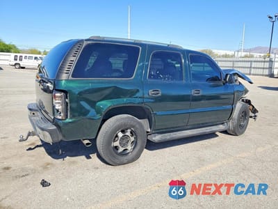 Trzecie zdjęcie samochodu z tyłu: 2003 CHEVROLET TAHOE C1500 VIN:1GNEC13ZX3J274129 - miniatura