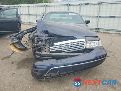 Piąte zdjęcie samochodu w środku: 2001 FORD CROWN VICTORIA LX VIN:2FAFP74W71X181569 - miniatura