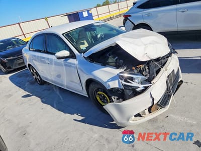 Czwarte zdjęcie samochodu z boku: 2014 VOLKSWAGEN JETTA SE VIN:3VWD07AJ4EM379779 - miniatura