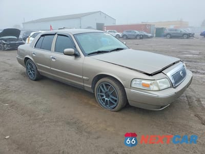 Czwarte zdjęcie samochodu z boku: 2006 MERCURY GRAND MARQUIS LS VIN:2MEFM75V56X650625 - miniatura