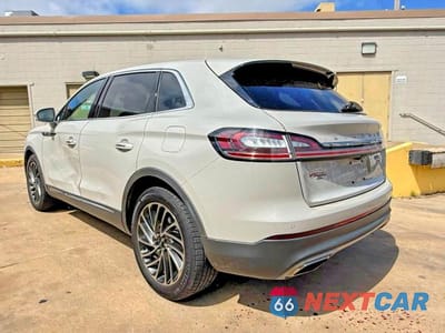 Trzecie zdjęcie samochodu z tyłu: 2019 LINCOLN NAUTILUS RESERVE VIN:2LMPJ6L92KBL50613 - miniatura