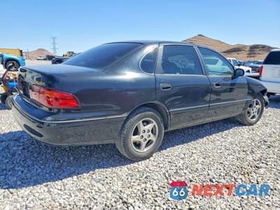 Trzecie zdjęcie samochodu z tyłu: 1999 TOYOTA AVALON XL VIN:4T1BF18B8XU348422 - miniatura