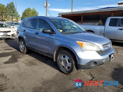 Czwarte zdjęcie samochodu z boku: 2007 HONDA CR-V LX VIN:JHLRE48337C014047 - miniatura
