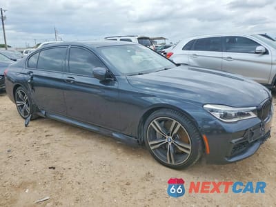 Czwarte zdjęcie samochodu z boku: 2019 BMW 750 I VIN:WBA7F0C51KGM24895 - miniatura