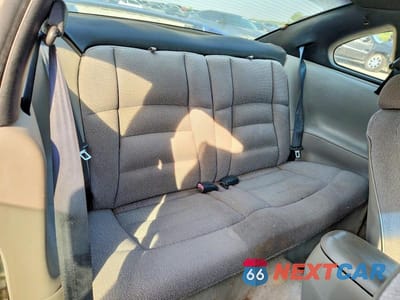 Zdjęcie 10 z 11 samochodu: 1997 FORD MUSTANG VIN:1FALP404XVF207704 - miniatura