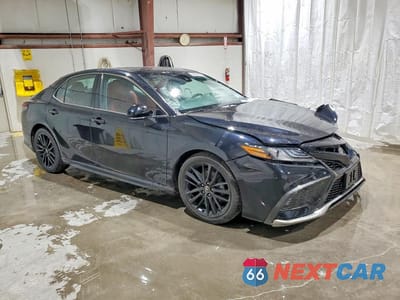 Czwarte zdjęcie samochodu z boku: 2021 TOYOTA CAMRY XSE VIN:4T1K61BK8MU039294 - miniatura