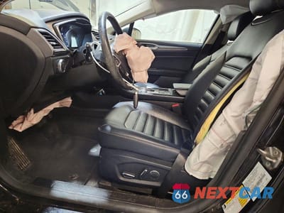 Zdjęcie 7 z 12 samochodu: 2019 FORD FUSION SEL VIN:3FA6P0CDXKR213809 - miniatura